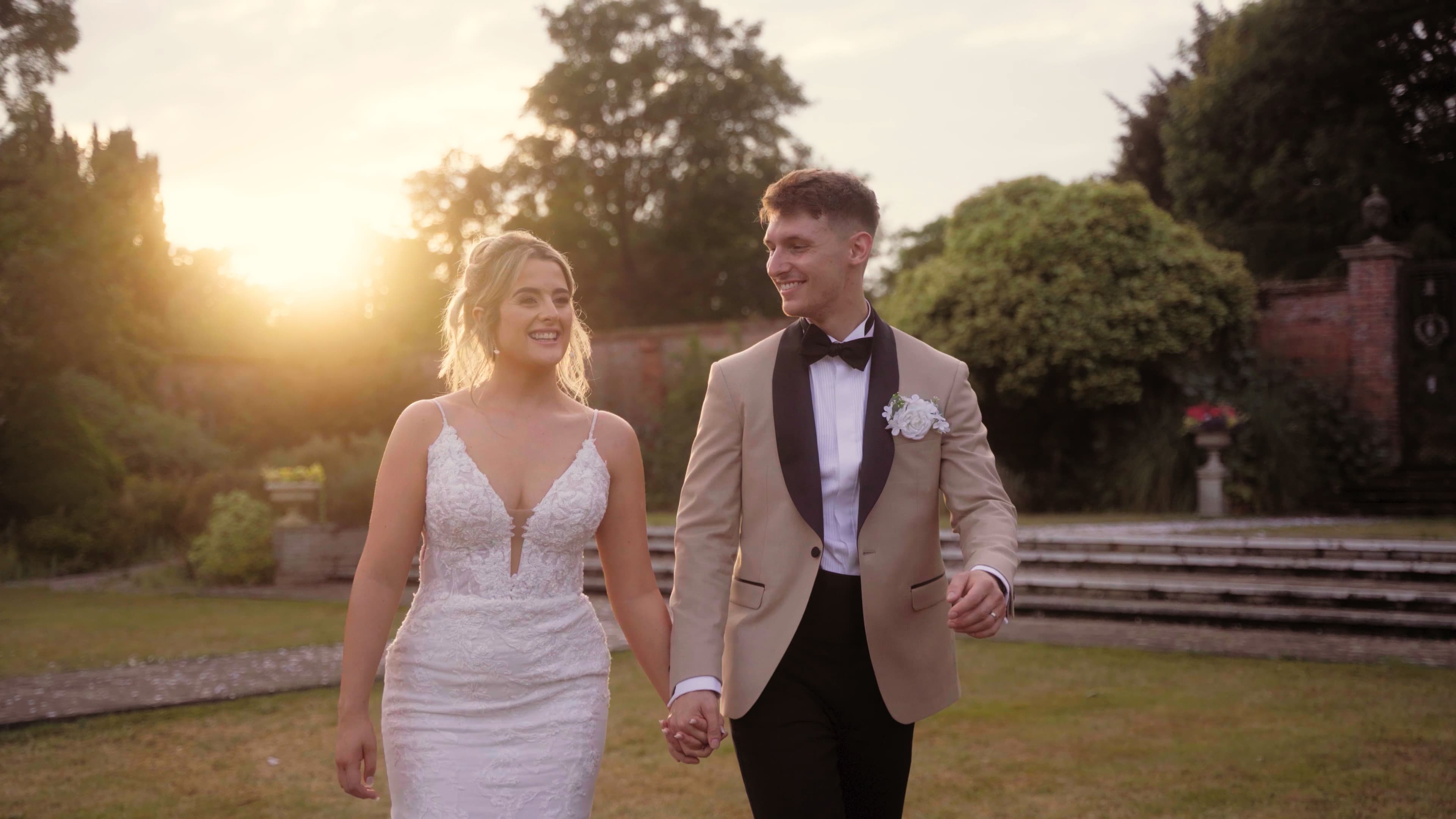 Neave and Ali sharing a quiet embrace at sunset